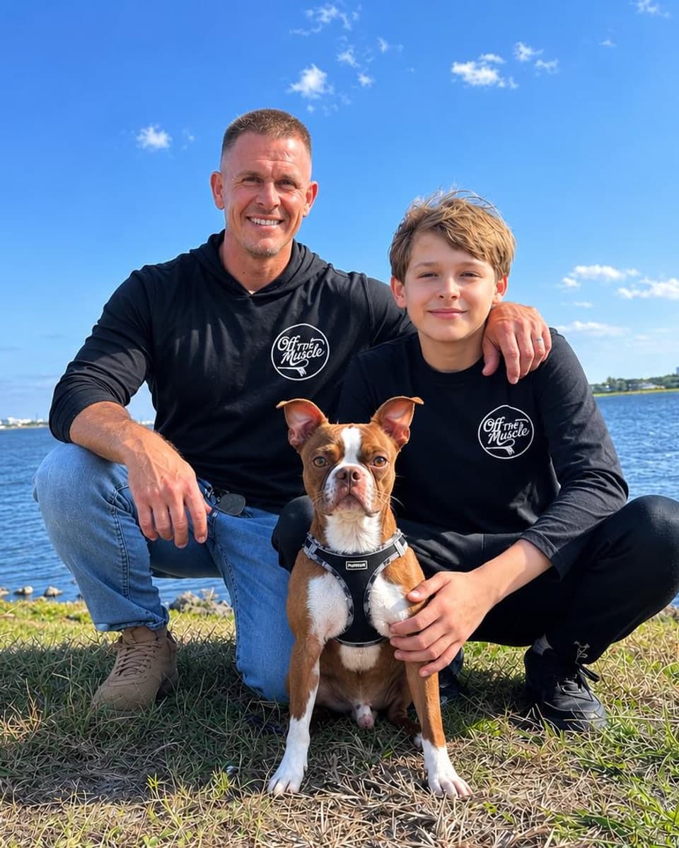 Jason, owner of Off The Muscle, with his son in matching company shirts